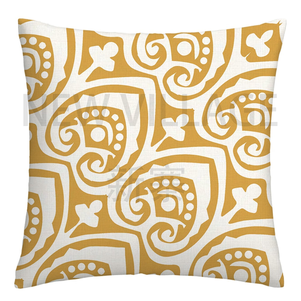 Yellow and white linen cushion covers