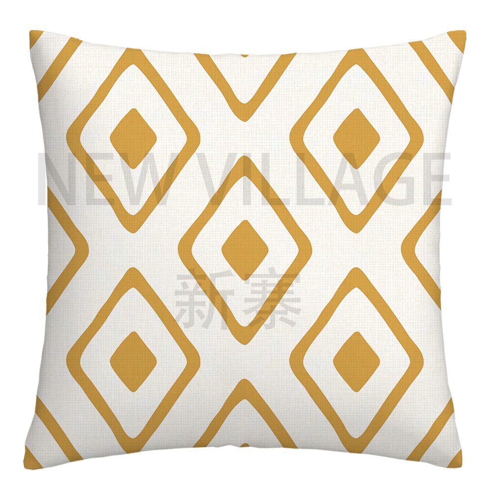 Yellow and white linen cushion covers