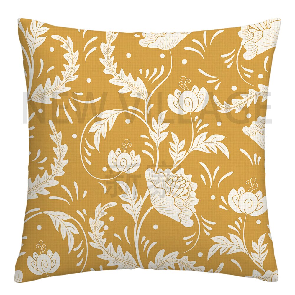 Yellow and white linen cushion covers