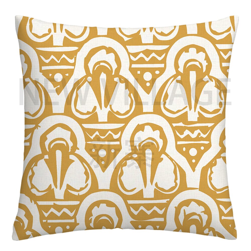 Yellow and white linen cushion covers