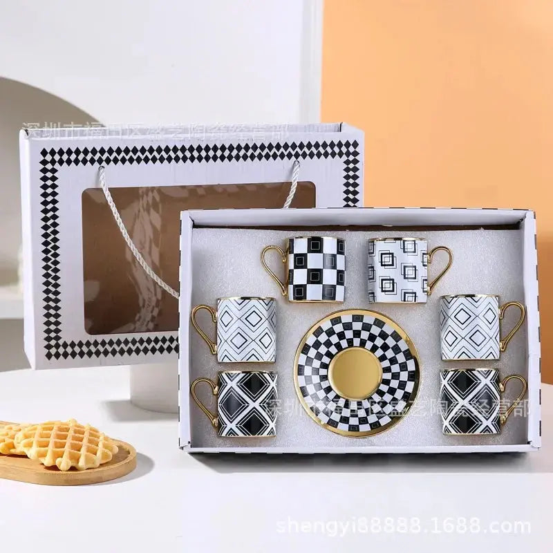 art deco coffee tea cup saucer set with gold handles and black and white art deco style pattern in a gift box 