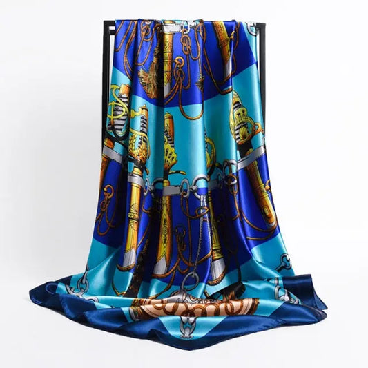 Light and royal blues with a gold colour chain print detail scarf 